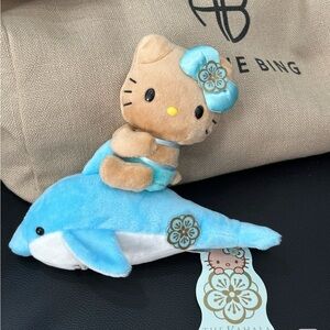 Hello kitty on dolphin